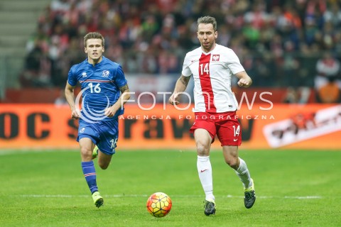  13.11.2015 WARSZAWA PILKA NOZNA <br />FRIENDLY FOOTBALL MATCH<br />POLISH NATIONAL TEAM<br />MECZ TOWARZYSKI<br />MECZ POLSKA - ISLANDIA<br />N/Z JAKUB WAWRZYNIAK ARNOR INGVI TRAUSTASON<br /> 