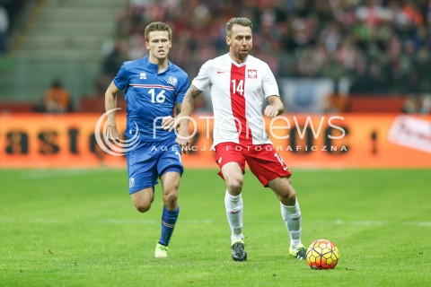  13.11.2015 WARSZAWA PILKA NOZNA <br />FRIENDLY FOOTBALL MATCH<br />POLISH NATIONAL TEAM<br />MECZ TOWARZYSKI<br />MECZ POLSKA - ISLANDIA<br />N/Z JAKUB WAWRZYNIAK ARNOR INGVI TRAUSTASON<br /> 