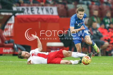  13.11.2015 WARSZAWA PILKA NOZNA <br />FRIENDLY FOOTBALL MATCH<br />POLISH NATIONAL TEAM<br />MECZ TOWARZYSKI<br />MECZ POLSKA - ISLANDIA<br />N/Z ARNOR INGVI TRAUSTASON JAKUB WAWRZYNIAK<br /> 