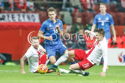  13.11.2015 WARSZAWA PILKA NOZNA <br />FRIENDLY FOOTBALL MATCH<br />POLISH NATIONAL TEAM<br />MECZ TOWARZYSKI<br />MECZ POLSKA - ISLANDIA<br />N/Z ARNOR INGVI TRAUSTASON PIOTR ZIELINSKI JAKUB WAWRZYNIAK<br /> 