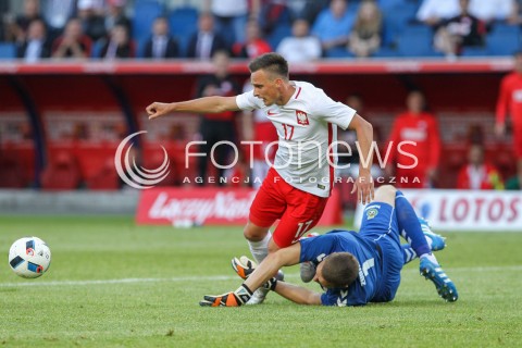  06.06.2016 KRAKOW REPREZENTACJA <br />MECZ TOWARZYSKI POLSKA - LITWA <br />( FRIENDLY MATCH POLAND - LITHUANIA ) <br />N/Z SLAWOMIR PESZKO EMILIJUS ZUBAS OBRONA PARADA<br /> 