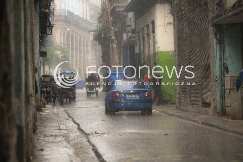  02.12.2016 KUBA HAWANA<br />ZDJECIE ILUSTRACYJNE<br />POJAZDY NA KUBIE<br />N/Z RIKSZA NA ULICACH HAWANY PODCZAS DESZCZU<br /> 