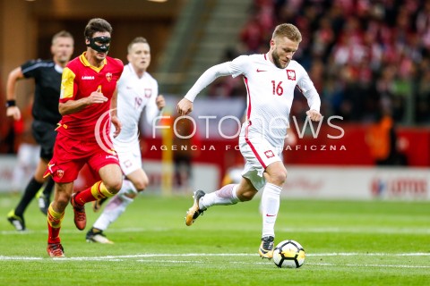  08.10.2017 WARSZAWA STADION NARODOWY <br />PILKA NOZNA REPREZENTACJA KWALIFIKACJE DO MISTRZOSTW SWIATA ROSJA 2018<br />Football European Qualifiers Fifa World Cup Russia 2018<br />MECZ POLSKA - CZARNOGORA ( Poland - Montenegro )<br />N/Z JAKUB BLASZCZYKOWSKI NIKOLA VUKCEVIC <br /> 