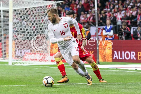  08.10.2017 WARSZAWA STADION NARODOWY <br />
PILKA NOZNA REPREZENTACJA KWALIFIKACJE DO MISTRZOSTW SWIATA ROSJA 2018<br />
Football European Qualifiers Fifa World Cup Russia 2018<br />
MECZ POLSKA - CZARNOGORA ( Poland - Montenegro )<br />
N/Z JAKUB BLASZCZYKOWSKI EMRAH KLIMENTA <br />
 