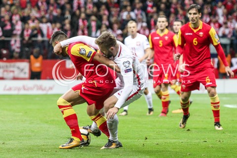  08.10.2017 WARSZAWA STADION NARODOWY <br />
PILKA NOZNA REPREZENTACJA KWALIFIKACJE DO MISTRZOSTW SWIATA ROSJA 2018<br />
Football European Qualifiers Fifa World Cup Russia 2018<br />
MECZ POLSKA - CZARNOGORA ( Poland - Montenegro )<br />
N/Z JAKUB BLASZCZYKOWSKI EMRAH KLIMENTA <br />
 