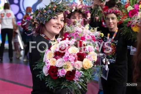  25.01.2026 WARSZAWA<br />34. FINAL WIELKIEJ ORKIESTRY SWIATECZNEJ POMOCY<br />N/Z WOLONTARIUSZ KWIATY<br /> 